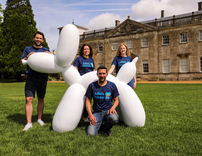 Julia's House team with the balloon dog